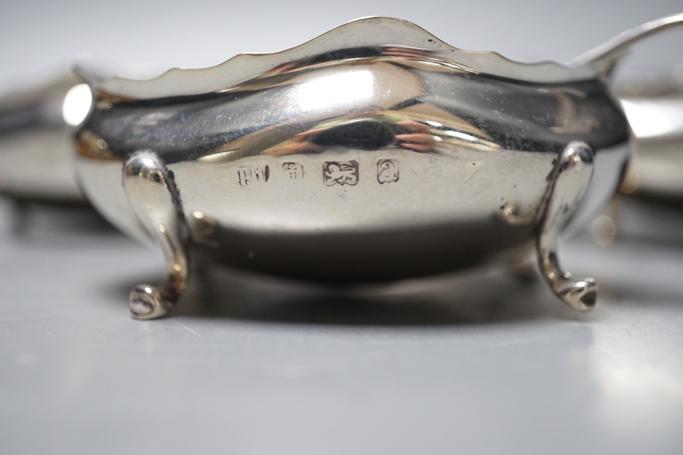 A set of four late Victorian silver oval salts and four matching spoons, Thomas Hayes, Birmingham, 1900, length 59mm.
